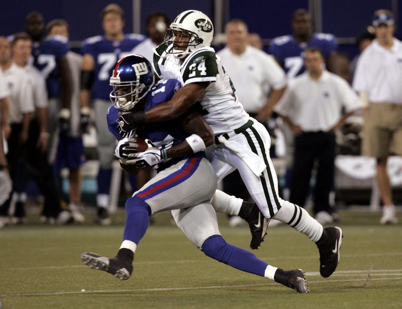 Plaxico Burress and Ty Law