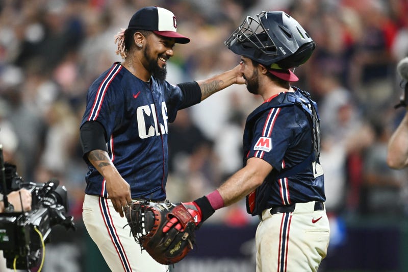 Aug 30, 2024; Cleveland, Ohio, USA; Cleveland Guardians relief pitcher Emmanuel Clase (48) celebrates with catcher Austin Hedges (27) after the Guardians beat the Pittsburgh Pirates at Progressive Field. Clase became the Guardians career saves leader in the game.