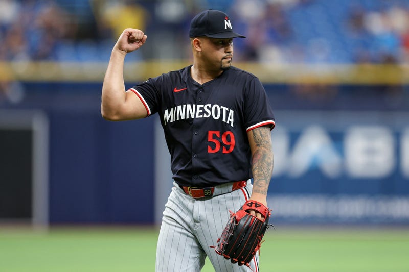 Minnesota Twins pitcher Jhoan Duran (59) reacts after beating the Tampa Bay Rays at Tropicana Field.