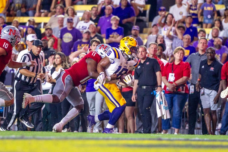 LSU running back Josh Williams gets tackled