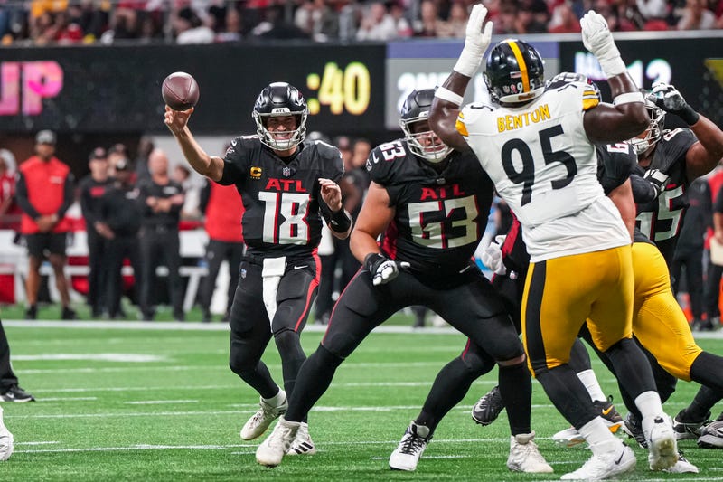 Sep 8, 2024; Atlanta, Georgia, USA; Atlanta Falcons quarterback Kirk Cousins (18) passes against the Pittsburgh Steelers at Mercedes-Benz Stadium. Mandatory Credit: Dale Zanine-Imagn Images