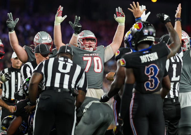UNLV Rebels offensive lineman Tiger Shanks (70) celebrates after the go-ahead touchdown late in the second half against the Kansas Jayhawks at Children's Mercy Park.