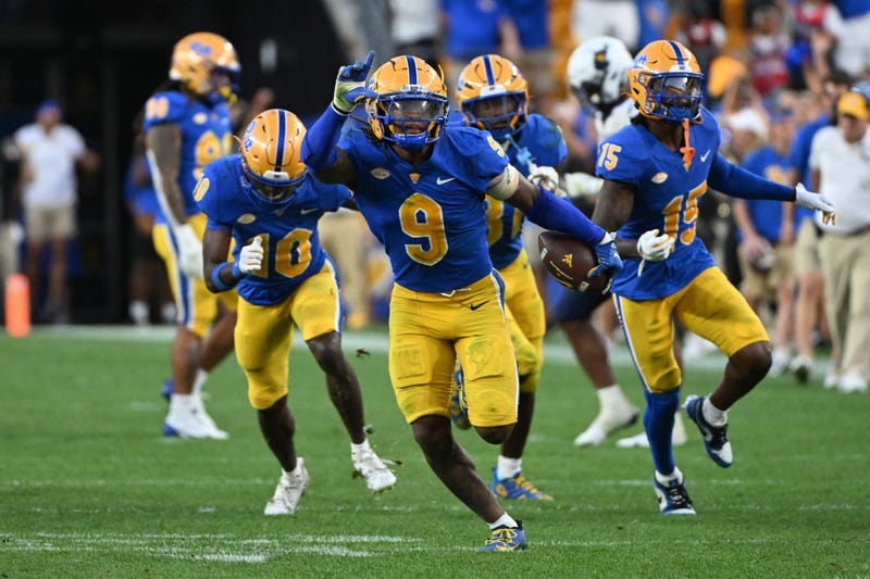 Kyle Louis celebrating on field