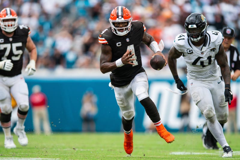 Cleveland Browns quarterback Deshaun Watson (4) runs against the Jacksonville Jaguars in the fourth quarter at EverBank Stadium. 