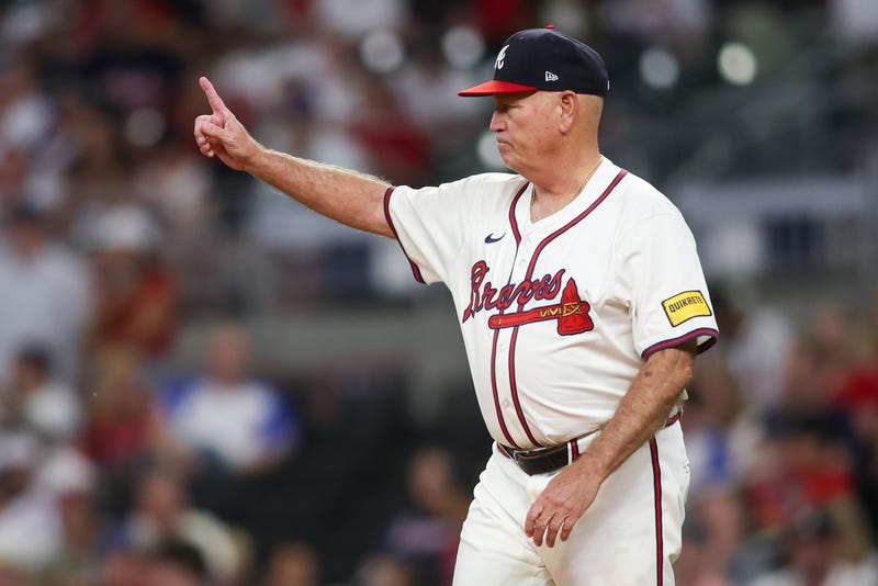 Sep 16, 2024; Atlanta, Georgia, USA; Atlanta Braves manager Brian Snitker (43) makes a pitching change against the Los Angeles Dodgers in the seventh inning at Truist Park. Mandatory Credit: Brett Davis-Imagn Images