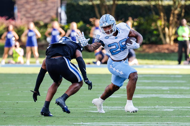 Omarion Hampton rushing for UNC vs Duke