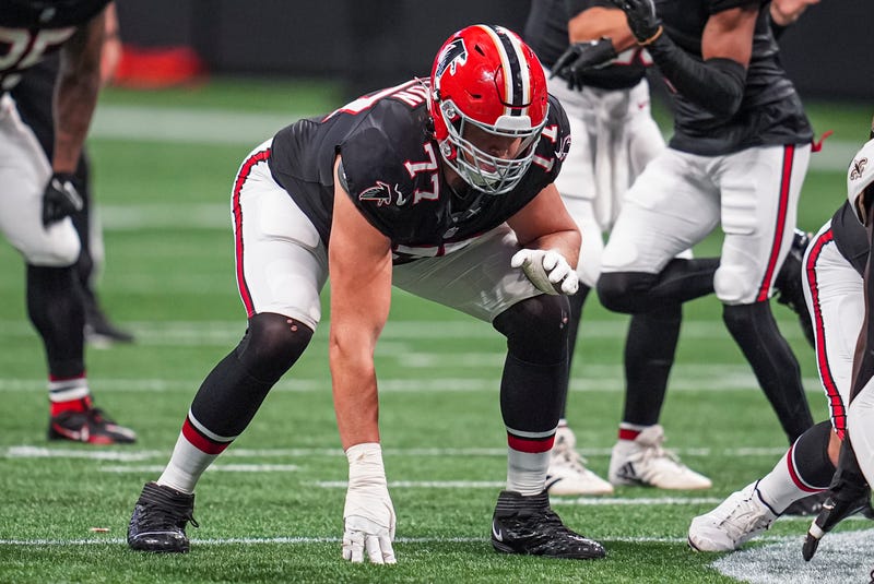 Atlanta Falcons offensive tackle Storm Norton (77) in action against the New Orleans Saints at Mercedes-Benz Stadium.