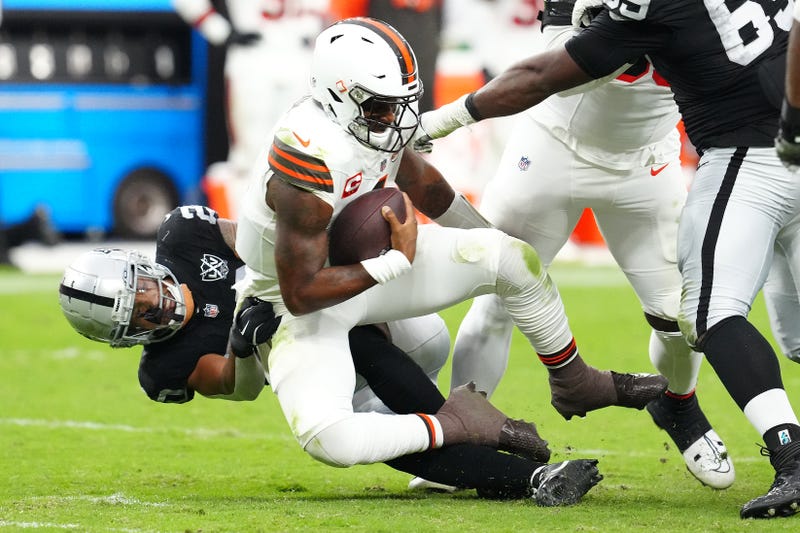 Las Vegas Raiders safety Isaiah Pola-Mao (20) sacks Cleveland Browns quarterback Deshaun Watson (4) during the fourth quarter at Allegiant Stadium.