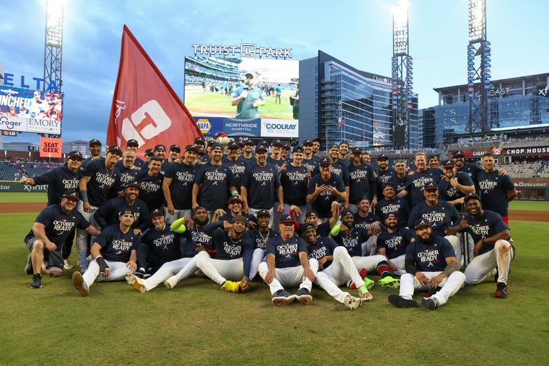 Sep 30, 2024; Atlanta, Georgia, USA; The Atlanta Braves pose for a team photo after clinching a wild card birth in the playoffs after a victory over the New York Mets at Truist Park. Mandatory Credit: Brett Davis-Imagn Images