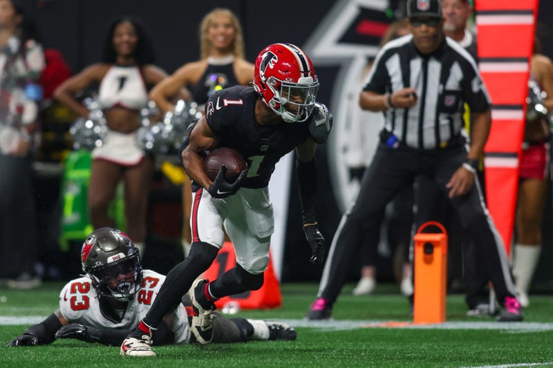 Atlanta Falcons wide receiver Darnell Mooney (1) runs after a catch for a touchdown against the Tampa Bay Buccaneers in the fourth quarter at Mercedes-Benz Stadium. 