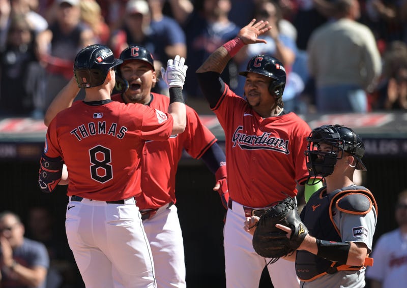 Oct 5, 2024; Cleveland, OH, USA; Cleveland Guardians outfielder Lane Thomas (8) celebrates with teammates after hitting a three-run home run against the Detroit Tigers in the first inning in game one of the ALDS for the 2024 MLB Playoffs at Progressive Field.