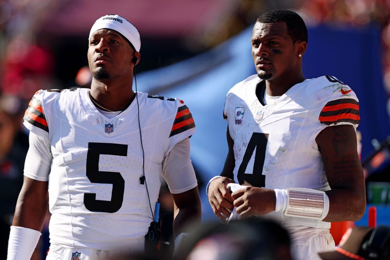 Oct 6, 2024; Landover, Maryland, USA; Cleveland Browns quarterback Deshaun Watson (4) and quarterback Jameis Winston (5) stand on the sideline during the fourth quarter of the game against the Washington Commanders at NorthWest Stadium. 