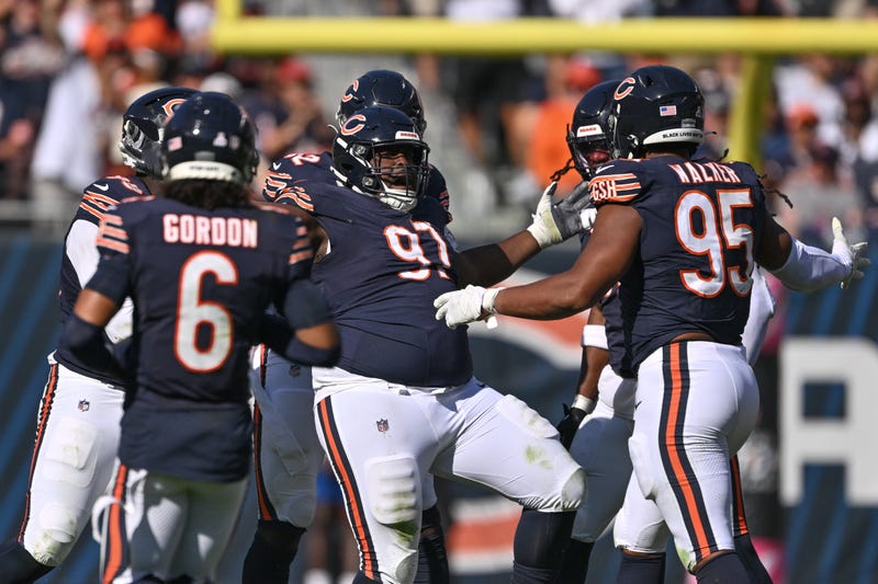Bears defensive tackle Andrew Billings, center, and teammates celebrate.