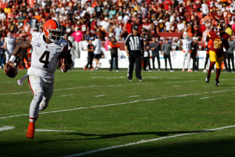 Cleveland Browns quarterback Deshaun Watson (4) runs with the ball against the Washington Commanders during the fourth quarter at NorthWest Stadium.