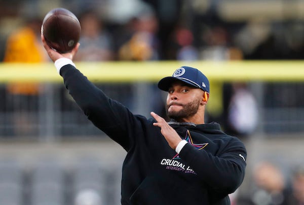 Dallas Cowboys quarterback Dak Prescott (4) warms up before the game against the Pittsburgh Steelers at Acrisure Stadium