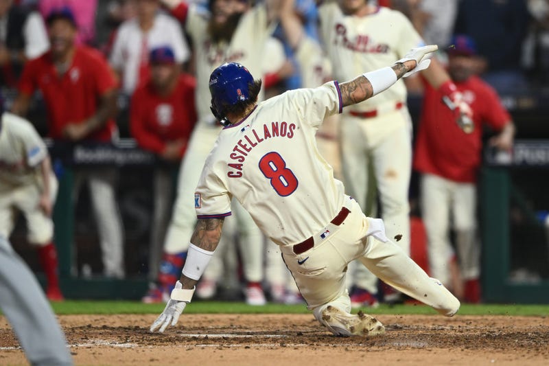 Phillies outfielder Nick Castellanos scores a run in the eighth inning against the New York Mets during Game Two of the NLDS for the 2024 MLB Playoffs at Citizens Bank Park.