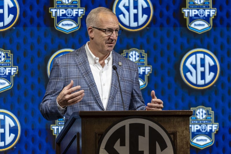 Oct 15, 2024; Birmingham, AL, USA; SEC commissioner Greg Sankey talks with the media during SEC Media Days at Grand Bohemian Hotel. Mandatory Credit: Vasha Hunt-Imagn Images