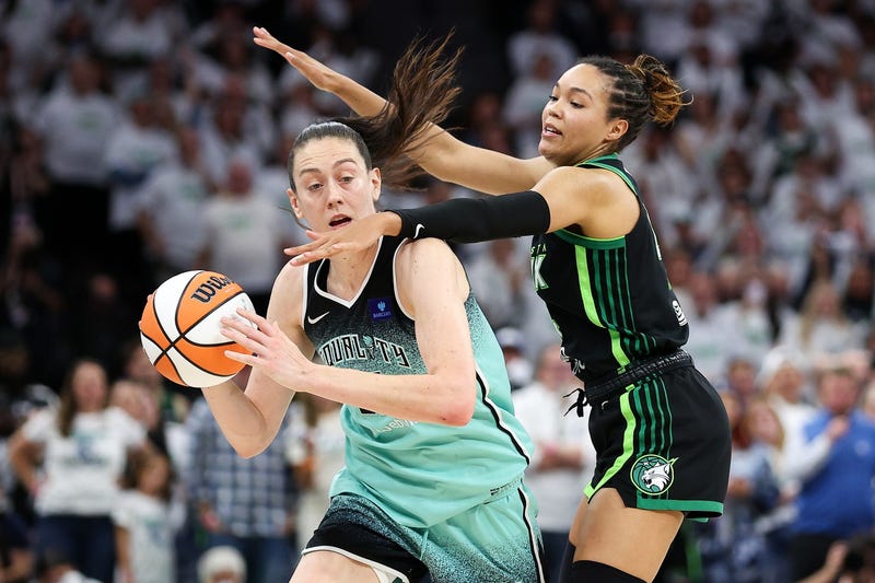 Lynx forward Napheesa Collier (24) defends against New York Liberty forward Breanna Stewart (30) during the second half of game three of the 2024 WNBA Finals at Target Center. 