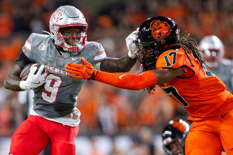 UNLV Rebels running back Jai'Den Thomas (9) stiff arms Oregon State Beavers defensive back Skyler Thomas (17) during an NCAA football game against UNLV at Reser Stadium on Saturday, Oct. 19, 2024, in Corvallis, Ore.