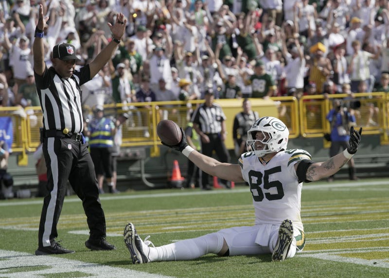 Oct 20, 2024; Green Bay, Wisconsin, USA; Green Bay Packers tight end Tucker Kraft (85) celebrates his touchdown reception during the second quarter of their game against the Houston Texans at Lambeau Field.