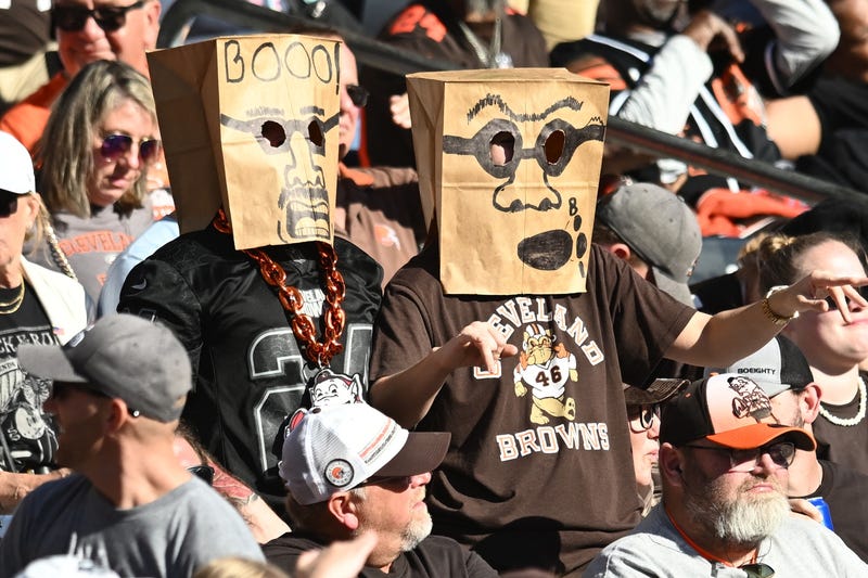 Cleveland Browns fans wear bags on their heads during the second half of the game against the Cincinnati Bengals at Huntington Bank Field.