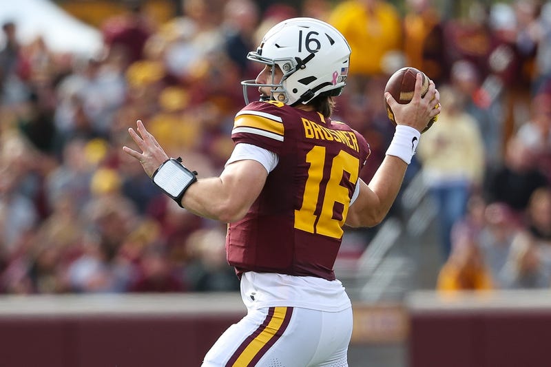 Golden Gophers quarterback Max Brosmer (16) throws the ball against the Maryland Terrapins during the first half at Huntington Bank Stadium.