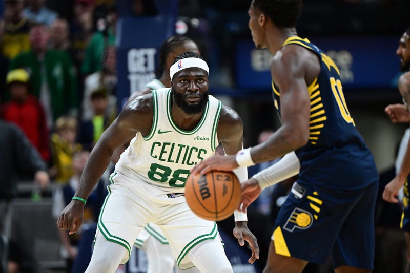 Boston Celtics center Neemias Queta (88) covers Indiana Pacers guard Bennedict Mathurin (00) during overtime at Gainbridge Fieldhouse.