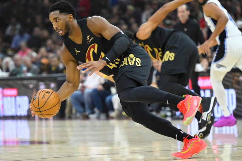 Cleveland Cavaliers guard Donovan Mitchell (45) picks up a loose ball in the first quarter against the Orlando Magic at Rocket Mortgage FieldHouse