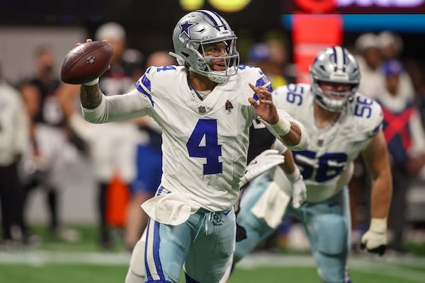 Dallas Cowboys quarterback Dak Prescott (4) throws a pass against the Atlanta Falcons in the third quarter at Mercedes-Benz Stadium