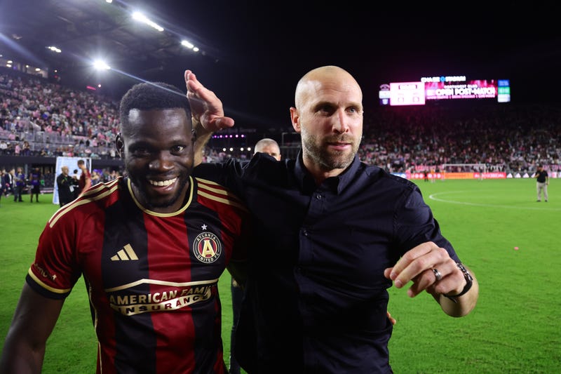 Nov 9, 2024; Fort Lauderdale, Florida, USA; Atlanta United interim head coach Rob Valentinou and forward Jamal Thiaré (29) celebrate after defeating the Inter Miami FC in a 2024 MLS Cup Playoffs Round One match at Chase Stadium. Mandatory Credit: Sam Navarro-Imagn Images