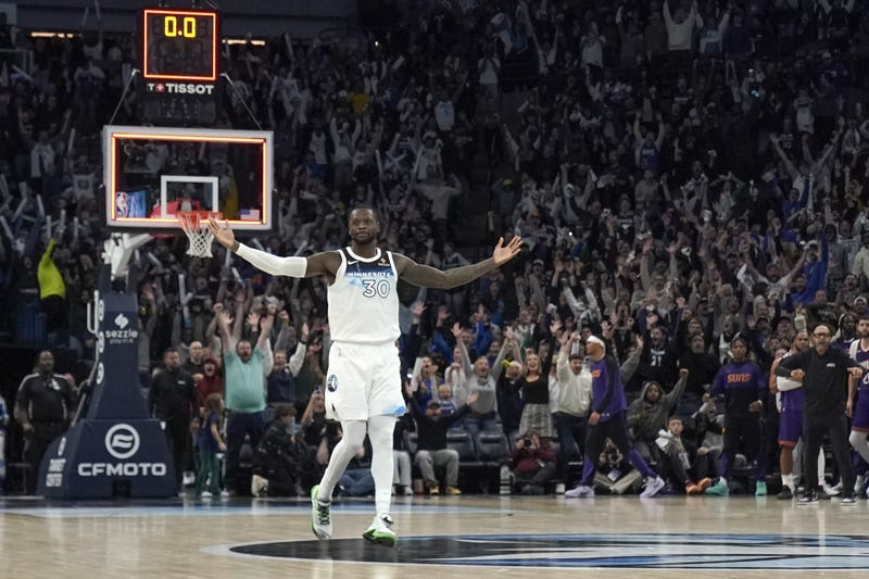 Minnesota Timberwolves forward Julius Randle (30) celebrates his game-winning three-pointer against the Phoenix Suns at the end of the fourth quarter at Target Center.