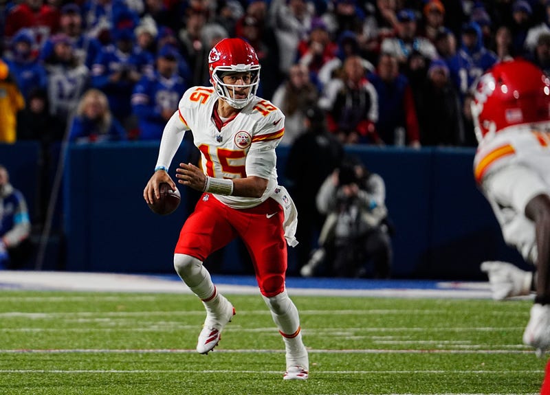 Kansas City's Patrick Mahomes starts to run with the ball when he can't find an open receiver late in the fourth quarter. His run for a first down was waived off when his team got called for a penalty. The Bills hosted Kansas City Chiefs in Orchard Park, Nov.17, 2024.