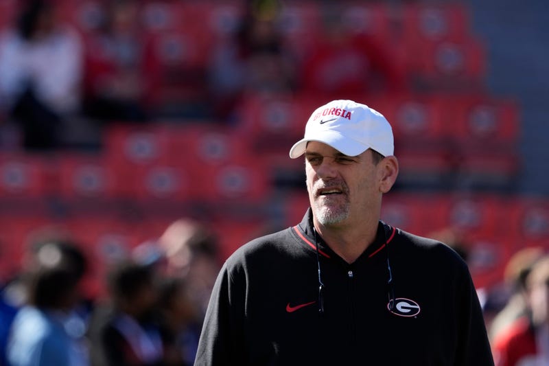 Georgia Offensive Coordinator Mike Bobo looks on before the start of a NCAA college football game against Massachusetts in Athens, Ga., on Saturday, Nov. 23, 2024.