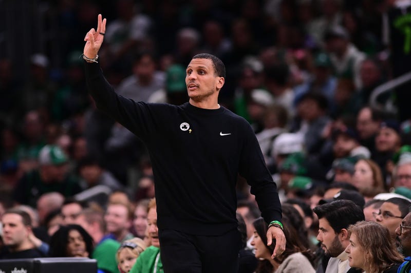Boston Celtics head coach Joe Mazzulla signals from the sideline during the first half against the Minnesota Timberwolves at TD Garden.