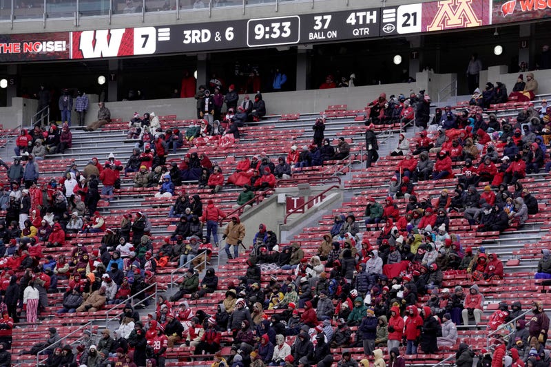 A dwindling number a spectators watch the Wisconsin - Minnesota during the fourth quarter of their game at Camp Randall Stadium Friday, November 29, 2024 in Madison, Wisconsin. Minnesota beat Wisconsin 24-7.