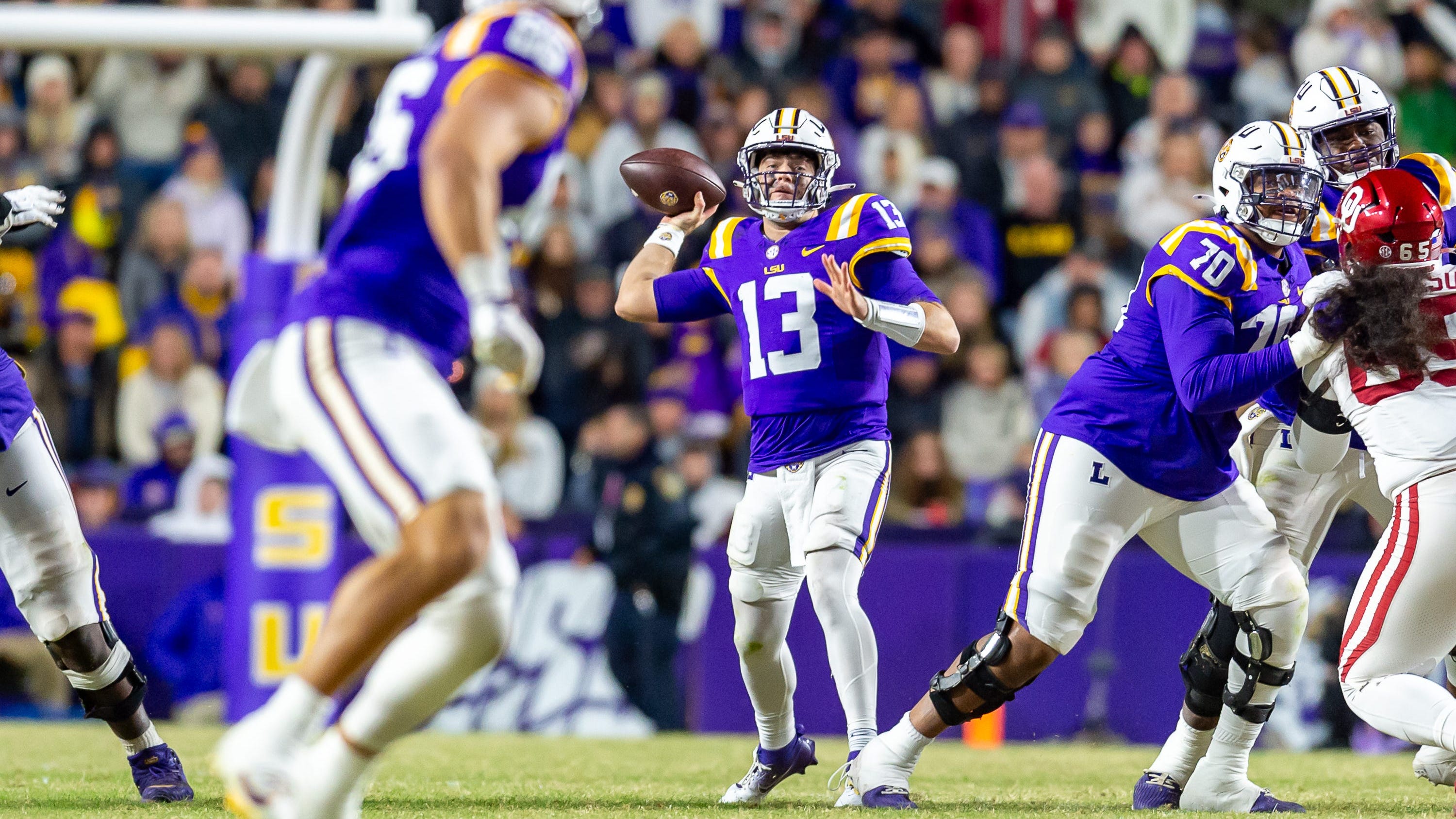 Nussmeier overcomes a shoulder injury and passes for 3 TDs as LSU tops Oklahoma 37-17