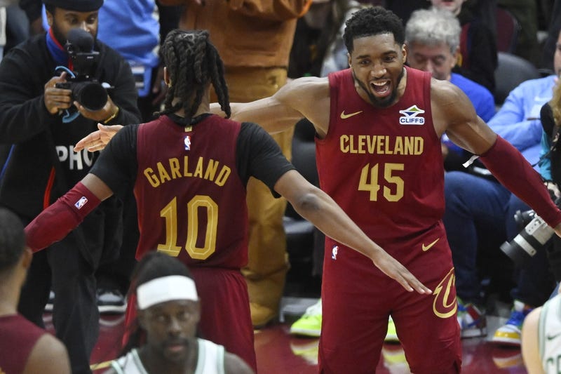 Dec 1, 2024; Cleveland, Ohio, USA; Cleveland Cavaliers guard Darius Garland (10) and guard Donovan Mitchell (45) celebrate a win over the Boston Celtics at Rocket Mortgage FieldHouse.