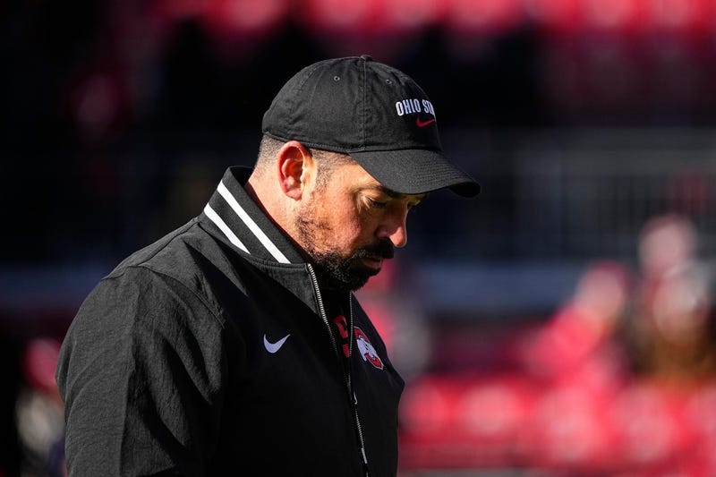 Ohio State Buckeyes head coach Ryan Day watches warm ups prior to the NCAA football game against the Michigan Wolverines at Ohio Stadium in Columbus on Tuesday, Dec. 3