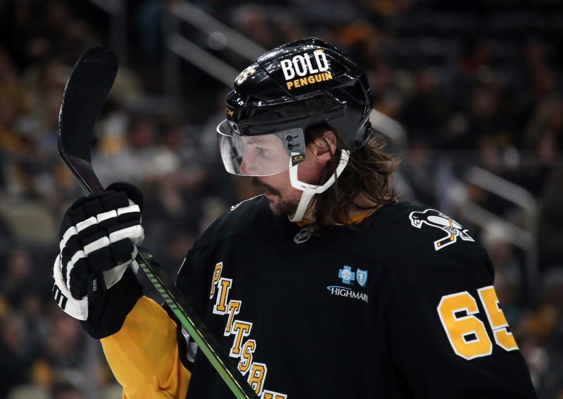 Erik Karlsson looking at stick