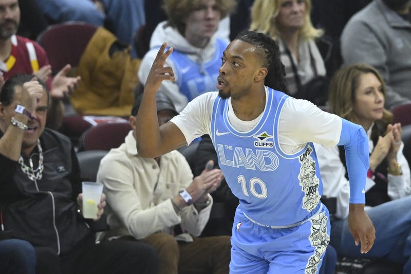 Dec 5, 2024; Cleveland, Ohio, USA; Cleveland Cavaliers guard Darius Garland (10) celebrates his three-point basket in the first quarter against the Denver Nuggets at Rocket Mortgage FieldHouse.