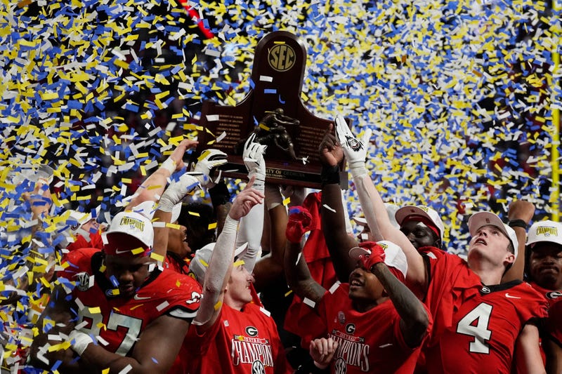 Georgia celebrates after the winning the SEC championship game against Texas in Atlanta, on Saturday, Dec. 7, 2024. Georgia won 22-19.