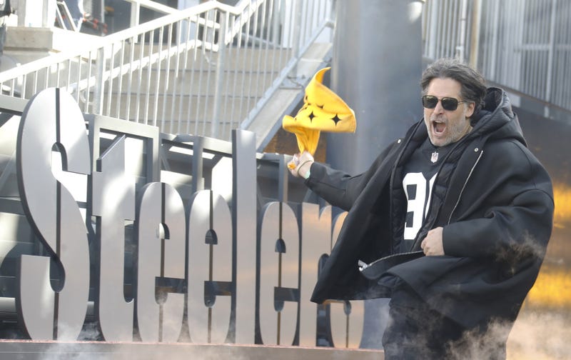 Television and motion picture actor Joe Manganiello leads the Terrible Towel wave against the Cleveland Browns at Acrisure Stadium.
