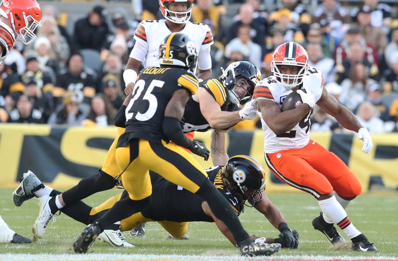Dec 8, 2024; Pittsburgh, Pennsylvania, USA; Cleveland Browns running back Nick Chubb (24) runs the ball against the Pittsburgh Steelers during the third quarter at Acrisure Stadium. Mandatory Credit: Charles LeClaire-Imagn Images