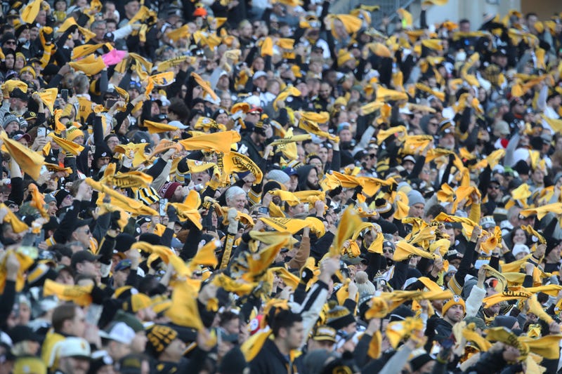 Steelers fans waving Terrible Towels