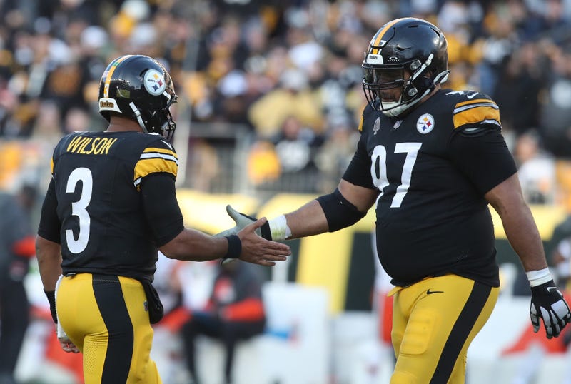 ; Pittsburgh Steelers quarterback Russell Wilson (3) and defensive tackle Cameron Heyward (97) shake hands against the Cleveland Browns