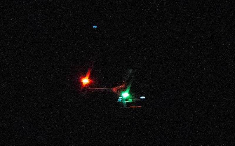A photo taken in Toms River, N.J., shows what appears to be a large drone hovering in the area at a high altitude