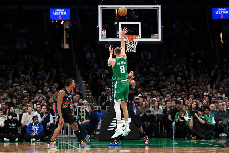 Boston Celtics center Kristaps Porzingis (8) shoots against the Detroit Pistons during the first half at TD Garden