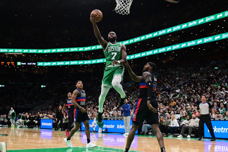 Boston Celtics guard Jaylen Brown (7) shoots a layup against the Detroit Pistons during the second half at TD Garden.