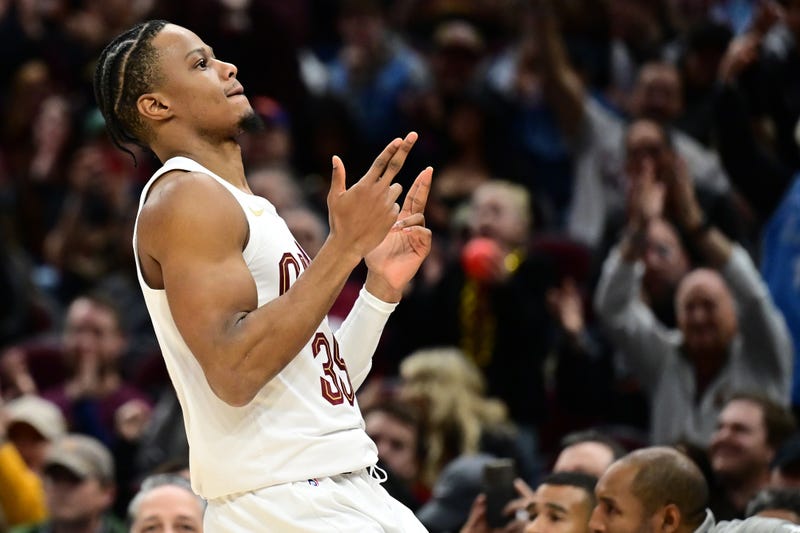 Dec 13, 2024; Cleveland, Ohio, USA; Cleveland Cavaliers forward Isaac Okoro (35) celebrates after hitting a three point basket during the second half against the Washington Wizards at Rocket Mortgage FieldHouse.