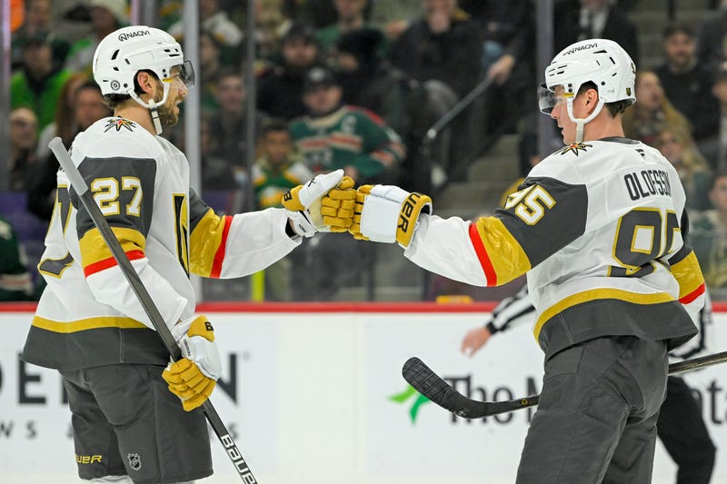 Vegas Golden Knights forward Victor Olofsson (95) celebrates his power play goal against the Minnesota Wild with defenseman Shea Theodore (27) during the first period at Xcel Energy Center.